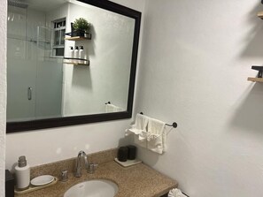 Hair dryer, towels, soap, toilet paper