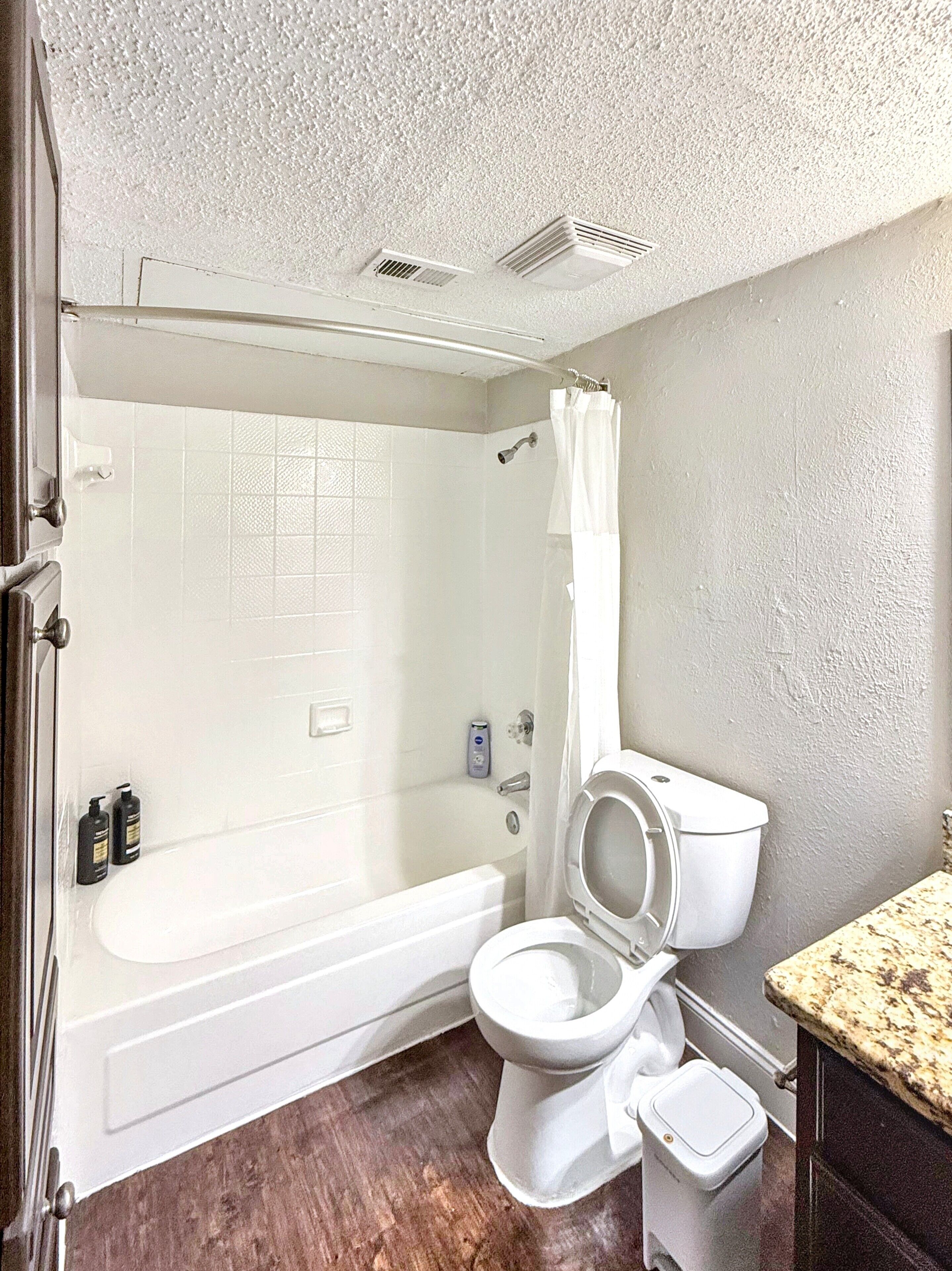 Hair dryer, towels, soap, shampoo