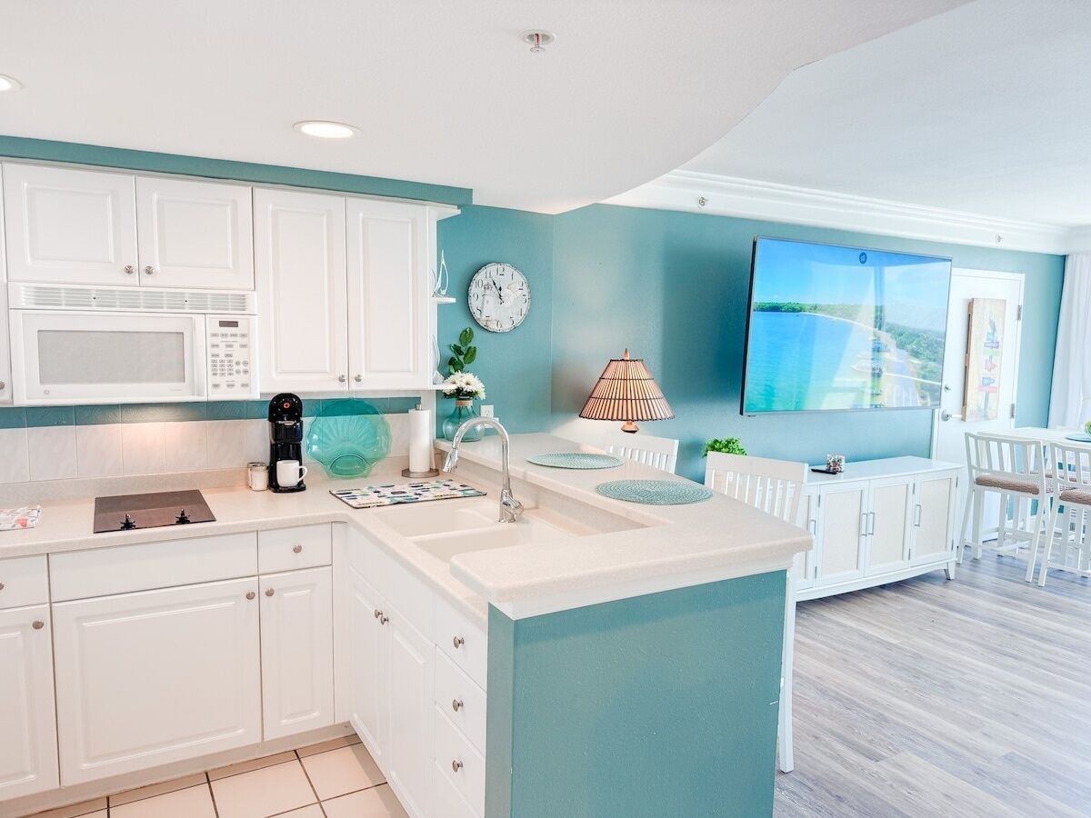 Microwave, coffee/tea maker, toaster, cookware/dishes/utensils