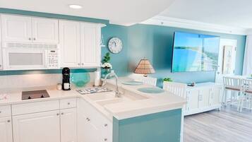 Microwave, coffee/tea maker, toaster, cookware/dishes/utensils