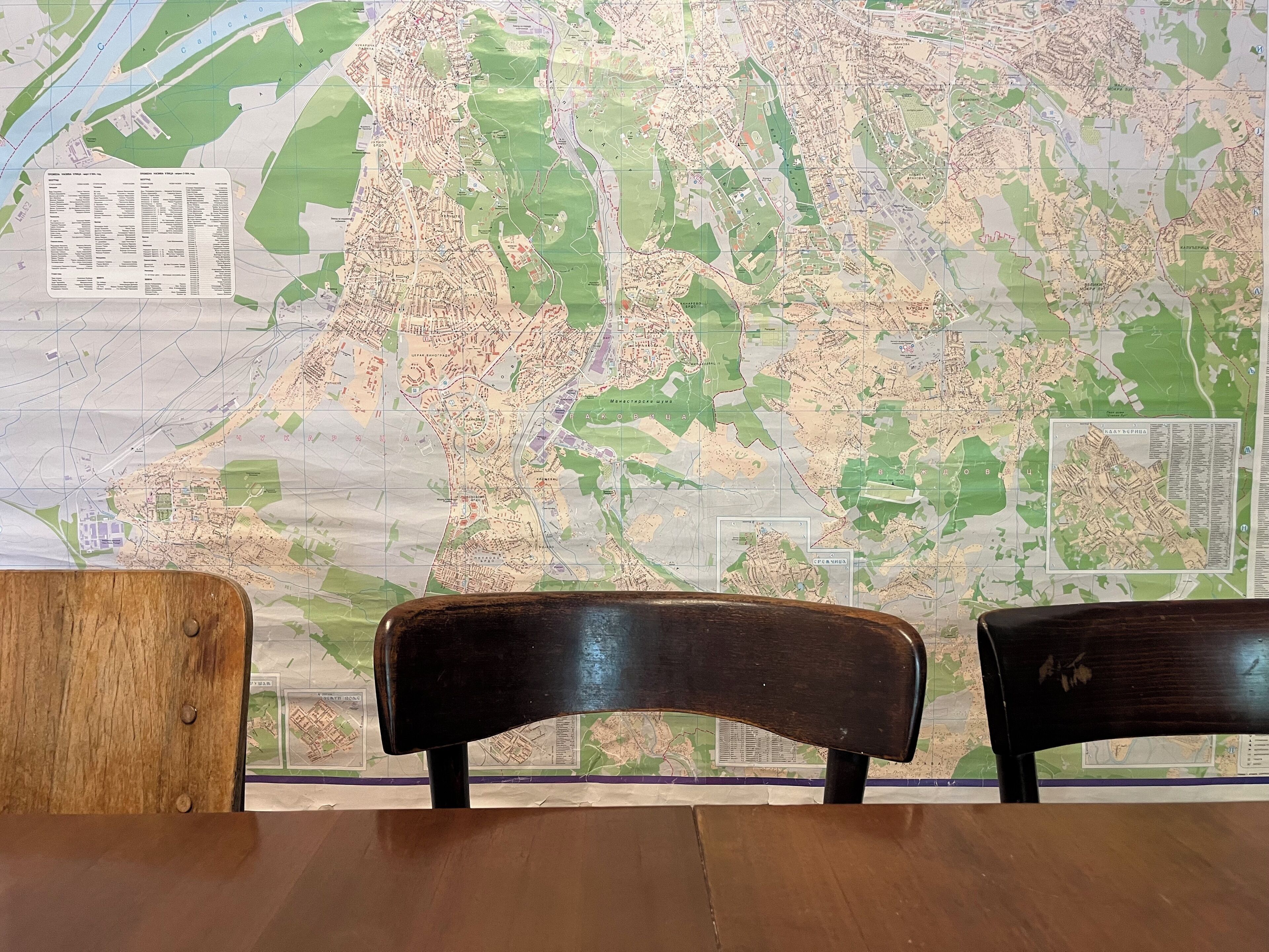 A map with a table and two chairs in front.