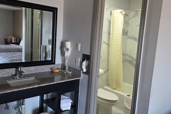 Hair dryer, towels, soap, shampoo