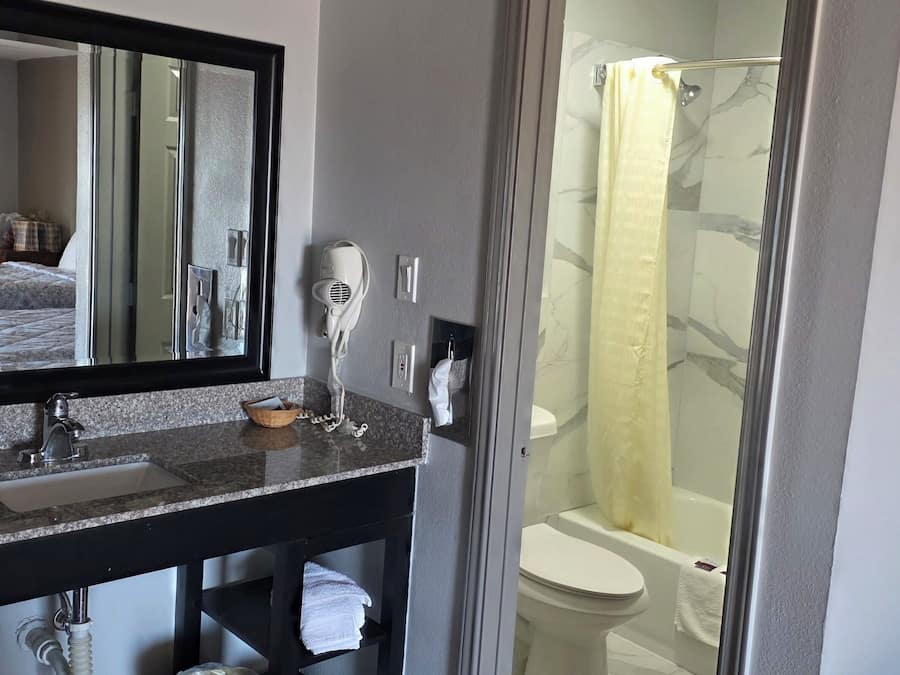 Hair dryer, towels, soap, shampoo