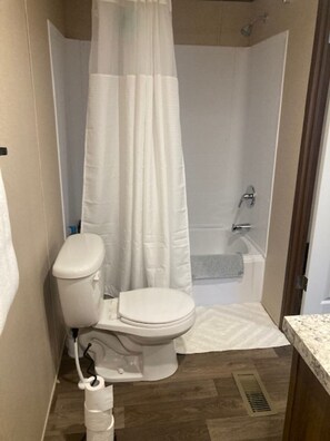 Hair dryer, towels, soap, shampoo