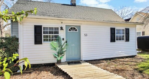 A small single-story house with a front door, number 53, and a small porch. - Mins to Hospital, Airport, Downtown (Greenville)