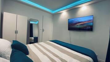 2 chambres, fer et planche à repasser, Wi-Fi, draps fournis