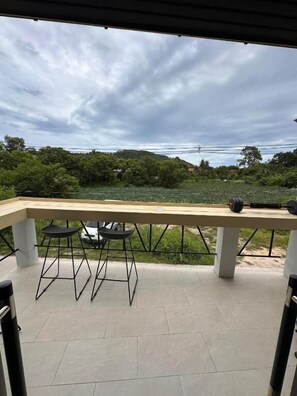 Deluxe Suite, Balcony, Lake View | Terrace/patio