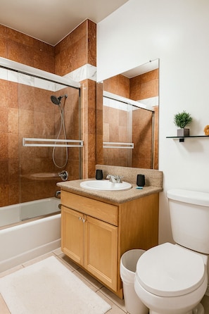 Shower, hair dryer, towels, soap