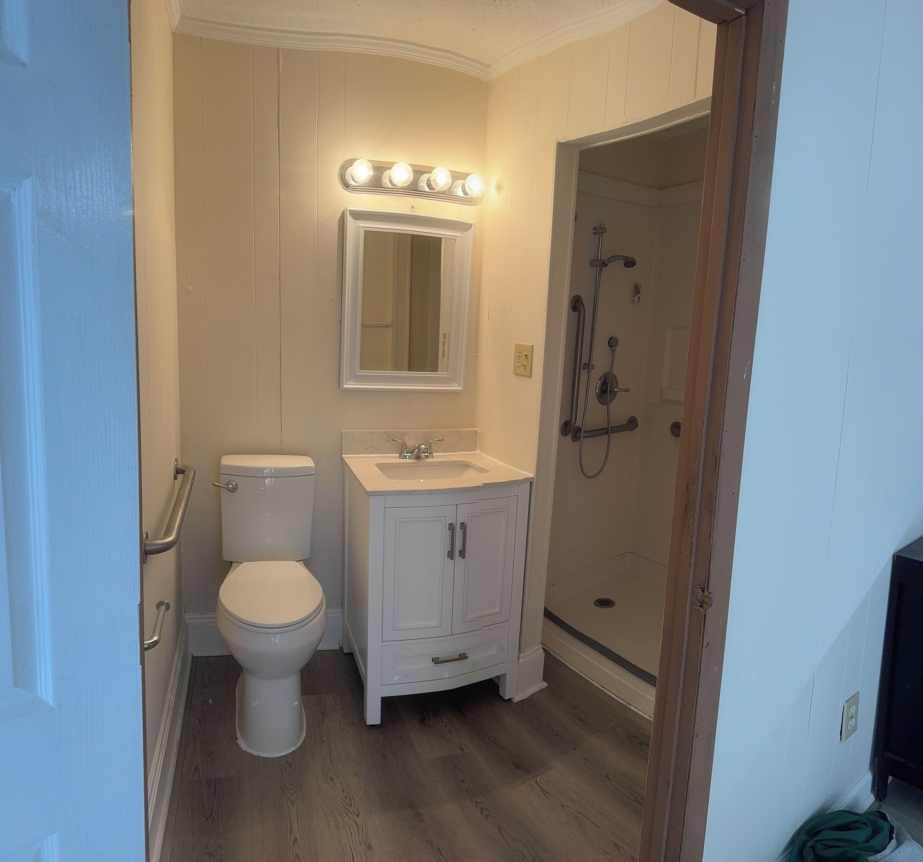 Shower, towels, soap, toilet paper