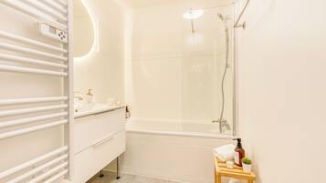 Hair dryer, towels, soap, shampoo