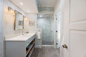 Shower, hair dryer, towels