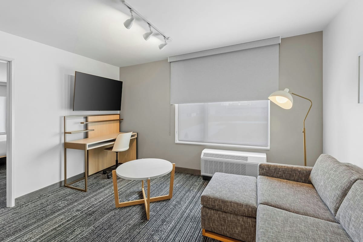 Blackout drapes, iron/ironing board, cribs (free), WiFi (free)