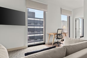 55-inch Smart TV with cable channels, Netflix, Hulu