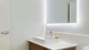 Shower, rainfall showerhead, hair dryer, towels