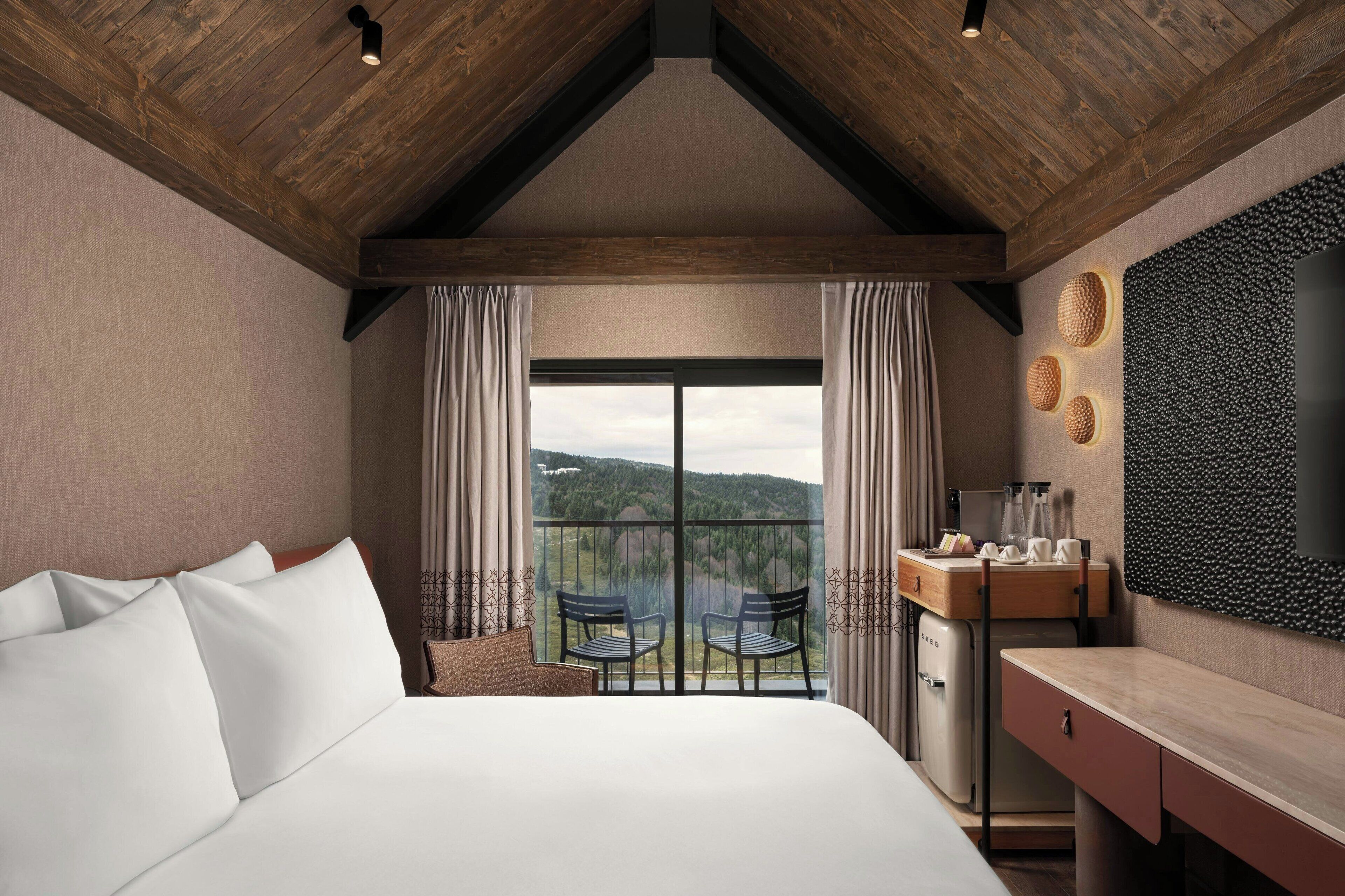 Family Room, 1 Double Bed, Balcony, Mountain View | Minibar, in-room safe, desk, laptop workspace