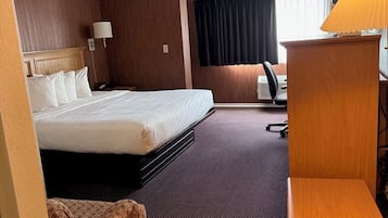 Room, 1 King Bed, Non Smoking | Desk, laptop workspace, blackout drapes, iron/ironing board