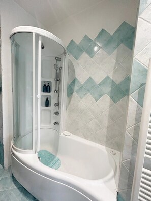 Hair dryer, bidet, towels, soap