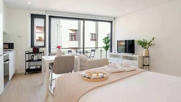 1 dormitorio, tabla de planchar con plancha, cuna de viaje y wifi gratis