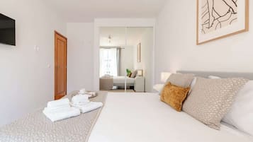 2 dormitorios, tabla de planchar con plancha, wifi gratis y ropa de cama