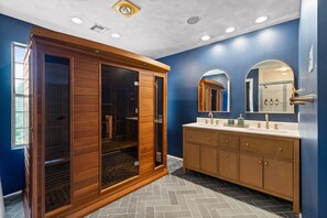 Shower, hair dryer, towels