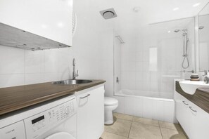 Hair dryer, soap, shampoo, toilet paper