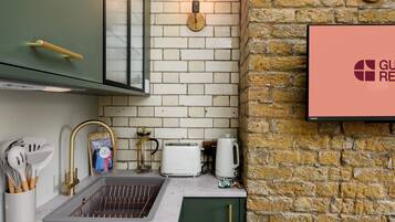 Fridge, microwave, coffee/tea maker, toaster