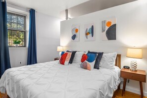 1 bedroom, desk, iron/ironing board, travel crib