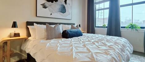 1 slaapkamer, een bureau, een strijkplank/strijkijzer, wifi