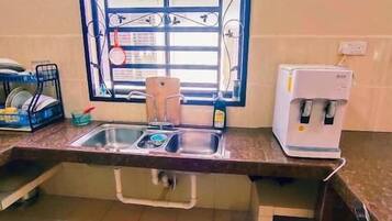 Fridge, microwave, cookware/dishes/utensils