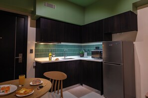 Deluxe Apartment, 1 Queen Bed with Sofa bed, Balcony, City View | Private kitchen | Fridge, microwave - Aeon Towers  (Davao)
