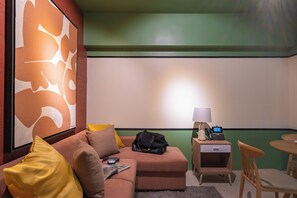 Deluxe Apartment, 1 Queen Bed with Sofa bed, Balcony, City View | Living area - Aeon Towers  (Davao)