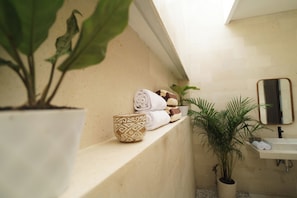 Luxury Suite, Courtyard View | Bathroom | Shower, free toiletries, hair dryer, towels