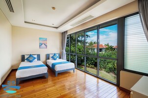 Deluxe Villa, Balcony, Lake View | In-room safe, desk, laptop workspace, blackout drapes