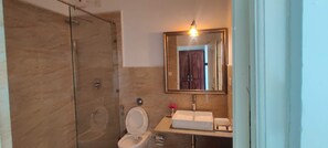 Luxury Suite, Lake View | Bathroom | Shower, towels, soap, shampoo