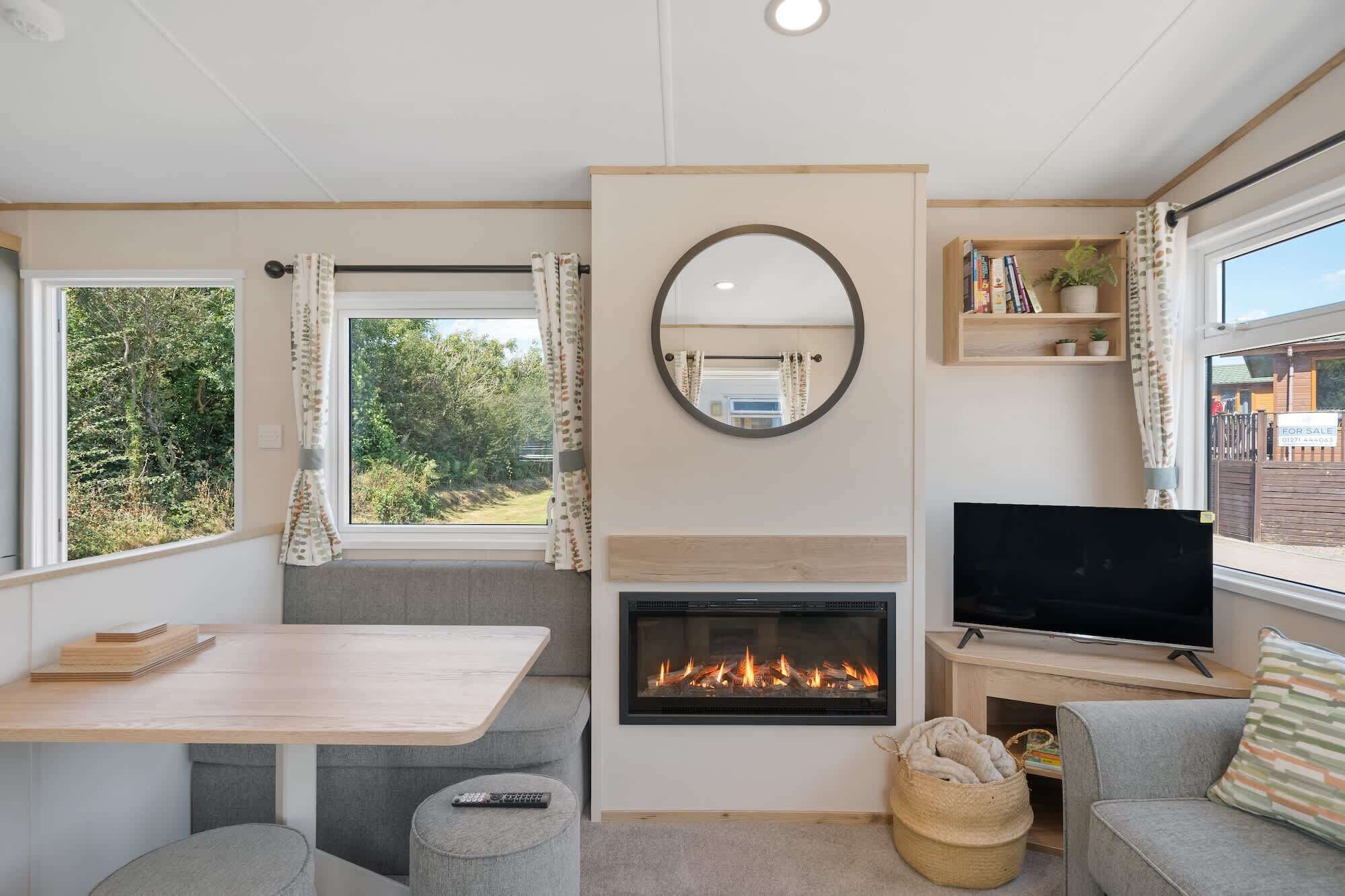 TV, fireplace, books, stereo