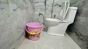 Family Quadruple Room | Bathroom | Towels, soap, shampoo, toilet paper