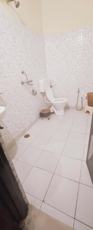 Basic Double Room, City View | Bathroom | Shower, towels, soap, toilet paper