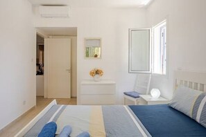 2 bedrooms, in-room safe, iron/ironing board, travel cot