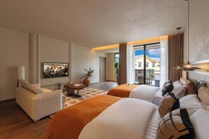 Suíte conforto, vista para a colina | Sala de estar | TV 55 polegadas com canais a cabo, impressoras