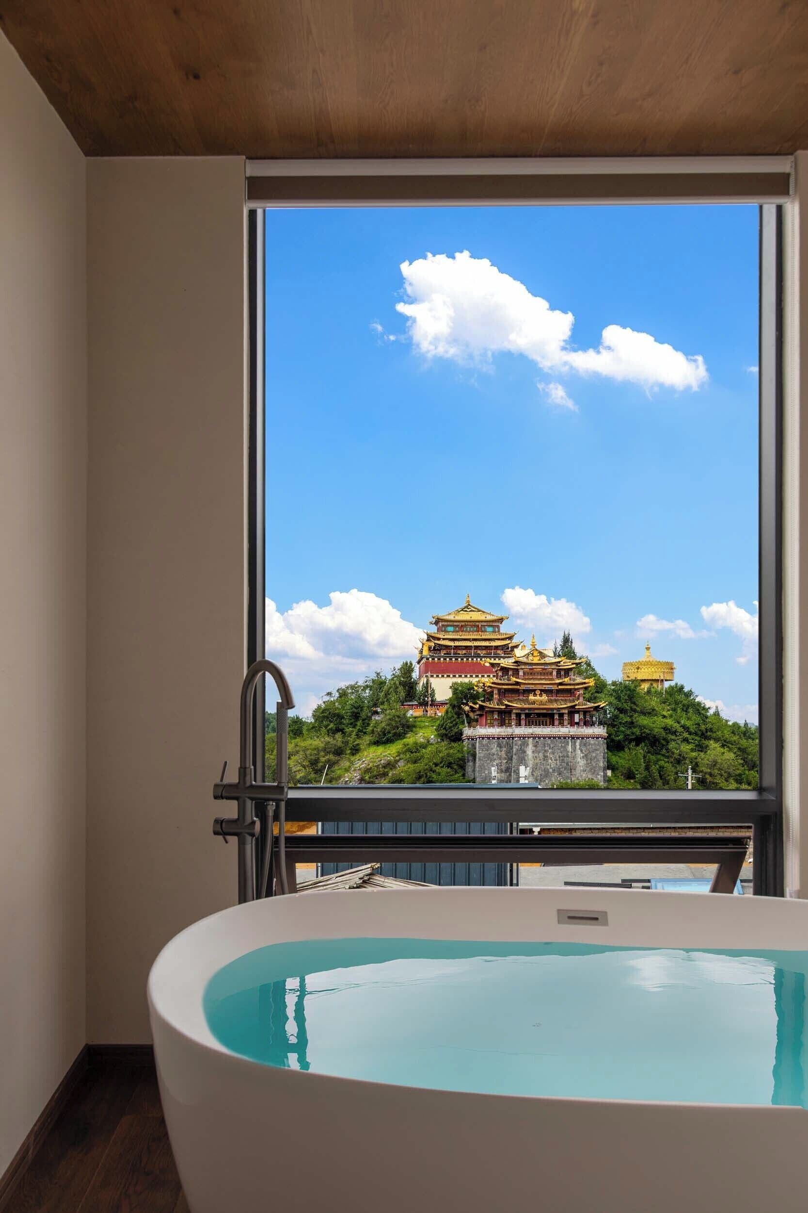 Panoramic Double Room, City View | Deep soaking bathtub