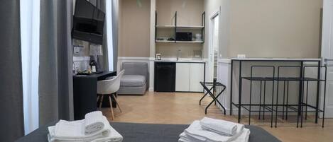 Suite junior | Ropa de cama de alta calidad, edredón y minibar