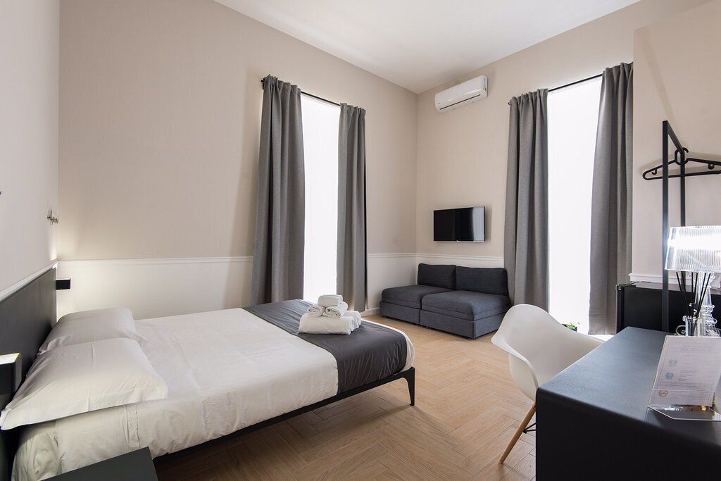 Premium bedding, down comforters, minibar, in-room safe