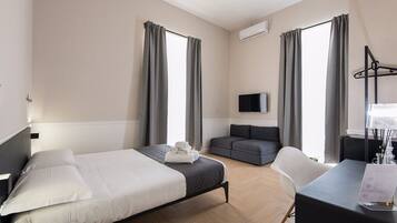 Premium bedding, down comforters, minibar, in-room safe