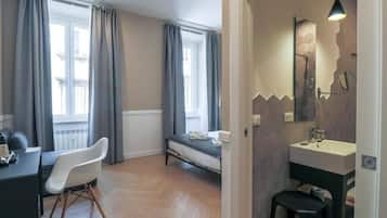 Premium bedding, down comforters, minibar, in-room safe