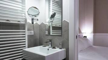 Shower, free toiletries, hair dryer, slippers