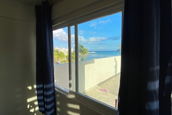 Departamento Confort, vista al mar | Ropa de cama de alta calidad y decoración personalizada