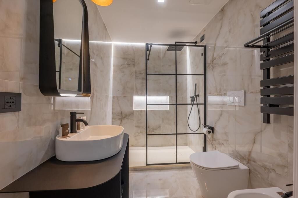 Shower, free toiletries, hair dryer, slippers