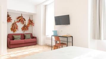 Habitación doble Deluxe | Escritorio, espacio para trabajar con laptop y cortinas blackout