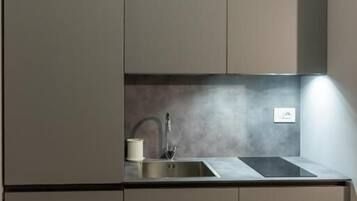 Deluxe Studio | Desk, laptop workspace, blackout drapes, soundproofing