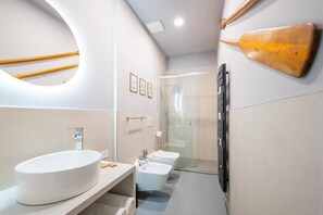 Superior Triple Room | Bathroom | Shower, hair dryer, towels, soap
